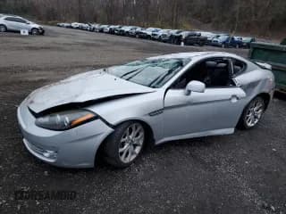 ✅ 2008 Hyundai Tiburon GT • VIN: KMHHN66F28U278515 • Лот: 92621525. Опубликован ранее на Copart с пробегом 89 774 миль. Бесплатный доступ к архиву аукционных продаж из США и подробный отчёт об истории автомобиля на DreamBid. Изображение 1.