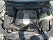 2009 Hyundai Genesis z VIN KMHGC46F09U063917, wystawiony jako Copart lot #70833994 z przebiegiem 198 670 mil mil oraz Szkoda całkowita • Salvage title. Historia ofert i sprzedaży dostępna na DreamBid. Obrazek 11.