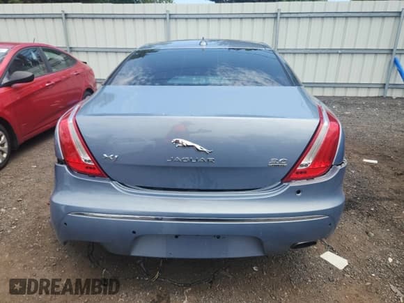 ✅ 2014 Jaguar XJ • VIN: SAJWJ1CD9E8V65840 • Lot: 66608205. Listed on Copart with 72,549 mi. Free auction sales archive from the USA and detailed vehicle history report at DreamBid. Image 6.