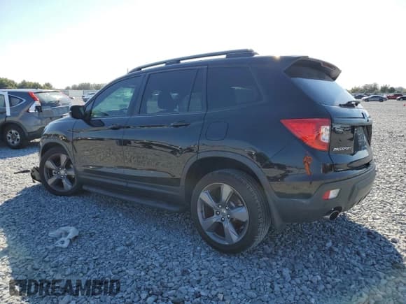 ✅ 2021 Honda Passport Touring • VIN: 5FNYF7H93MB015791 • Lot: 93383465. Listed on Copart with Not provided. Free auction sales archive from the USA and detailed vehicle history report at DreamBid. Image 2.