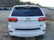 ✅ 2015 Jeep Grand Cherokee Summit • VIN: 1C4RJEJG0FC118974 • Lot: 49002165. Listed on Copart with 112,463 mi. Free auction sales archive from the USA and detailed vehicle history report at DreamBid. Image 6.