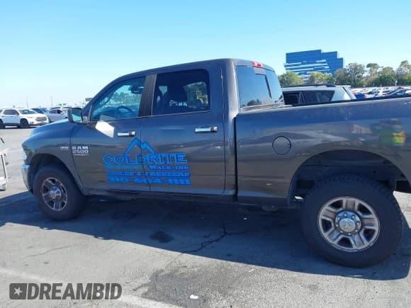 ✅ 2016 Ram 2500 SLT • VIN: 3C6TR4DT3GG390555 • Lot: 42894111. Listed on IAAI with 233,298 mi. Free auction sales archive from the USA and detailed vehicle history report at DreamBid. Image 14.