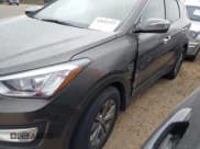✅ 2014 Hyundai Santa Fe • VIN: 5XYZUDLB1EG227778 • Lot: 43033757. Listed on IAAI with 135,496 mi. Free auction sales archive from the USA and detailed vehicle history report at DreamBid. Image 6.