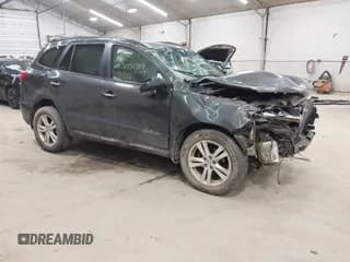 ✅ 2012 Hyundai Santa Fe Limited • VIN: 5XYZKDAG4CG112979 • Лот: 43051717. Опубликован ранее на IAAI с пробегом 164 154 миль. Бесплатный доступ к архиву аукционных продаж из США и подробный отчёт об истории автомобиля на DreamBid. Изображение 1.