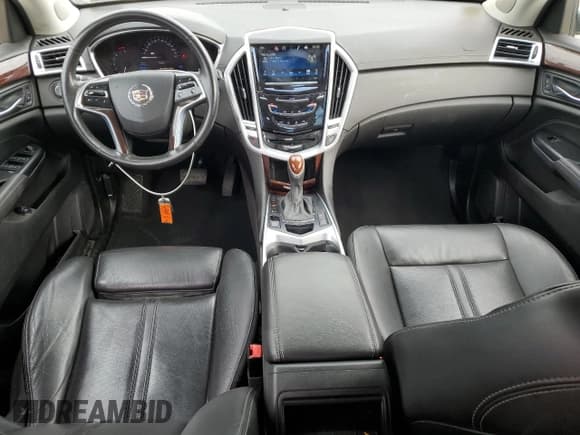 ✅ 2016 Cadillac SRX Luxury Collection • VIN: 3GYFNEE34GS575999 • Lot: 82143625. Wystawiony na Copart z przebiegiem 50 394 mil. Bezpłatny archiwum sprzedaży aukcyjnych z USA i szczegółowy raport historii pojazdu na DreamBid. Zdjęcie 8.