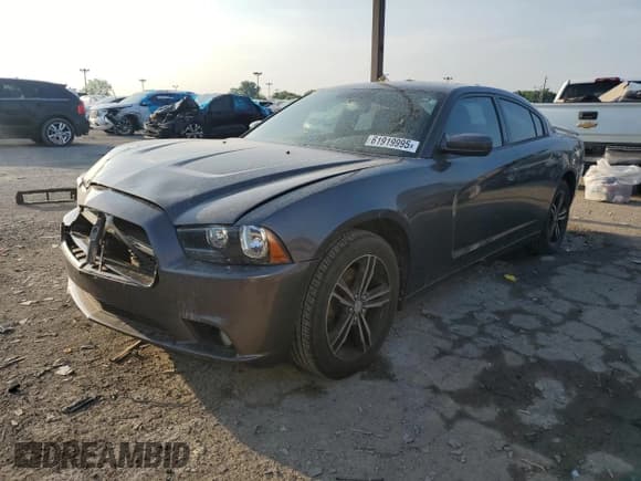 ✅ 2013 Dodge Charger SXT • VIN: 2C3CDXJG7DH608383 • Lot: 61919995. Listed on Copart with 221,592 mi. Free auction sales archive from the USA and detailed vehicle history report at DreamBid. Image 1.