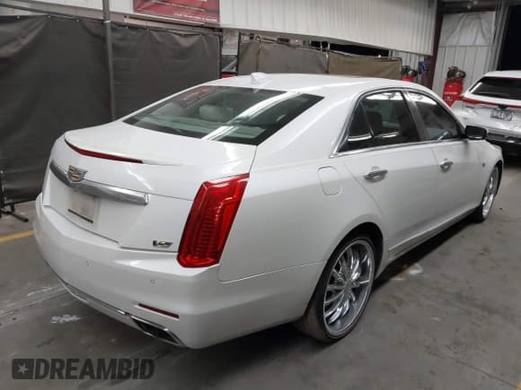 ✅ 2015 Cadillac CTS Luxury AWD • VIN: 1G6AX5SX2F0128856 • Lot: 42964622. Listed on IAAI with 117,061 mi. Free auction sales archive from the USA and detailed vehicle history report at DreamBid. Image 4.