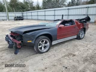 1987 Chevrolet Camaro with VIN 1G1FP21H2HN131699, listed as a Copart auction lot 87860445 with 86,117 mi miles and Salvage title. Bid and sale history available at DreamBid. Image 1.