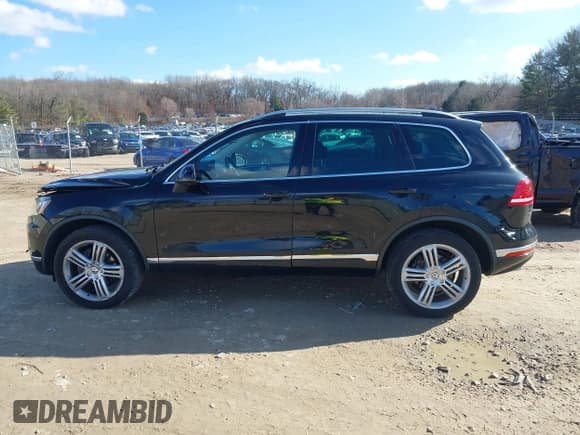 ✅ 2016 Volkswagen Touareg Lux • VIN: WVGEF9BP4GD001508 • Lot: 41850994. Wystawiony na IAAI z przebiegiem 63 355 mil. Bezpłatny archiwum sprzedaży aukcyjnych z USA i szczegółowy raport historii pojazdu na DreamBid. Zdjęcie 14.