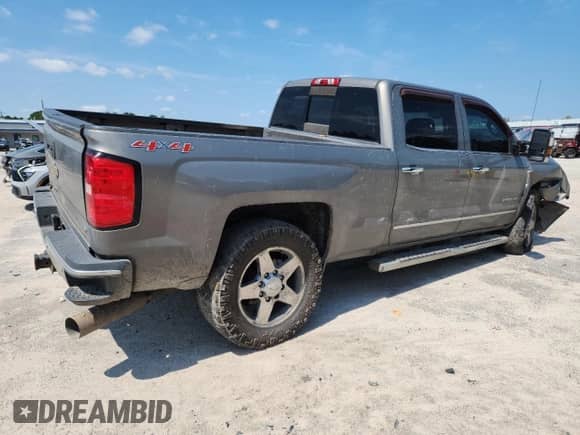 2017 Chevrolet Silverado 2500HD LTZ с VIN 1GC1KWEY4HF156440, выставлен на аукционе Copart как лот 71732905 с пробегом 180 327 миль миль и Списание • Salvage title. История ставок и продаж доступна на DreamBid. Изображение 3.