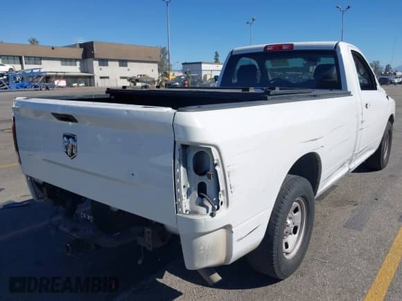 2017 Ram 1500 Tradesman with VIN 3C6JR6DGXHG741971, listed as a IAAI auction lot 43528890 with 187,496 mi miles and . Bid and sale history available at DreamBid. Image 4.