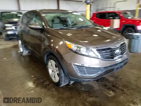 ✅ 2012 Kia Sportage LX • VIN: KNDPB3A28C7331687 • Lot: 60219055. Wystawiony na Copart z przebiegiem 87 591 mil. Bezpłatny archiwum sprzedaży aukcyjnych z USA i szczegółowy raport historii pojazdu na DreamBid. Zdjęcie 14.