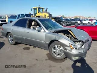 ✅ 1997 Lexus ES 300 • VIN: JT8BF22G1V0037870 • Lot: 42572906. Listed on IAAI with 218,006 mi. Free auction sales archive from the USA and detailed vehicle history report at DreamBid. Image 1.