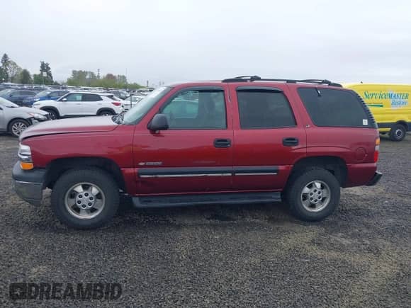 2001 Chevrolet Tahoe LT with VIN 1GNEK13T51R217446, listed as a IAAI auction lot 41970321 with 196,766 mi miles and . Bid and sale history available at DreamBid. Image 14.