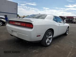 ✅ 2013 Dodge Challenger SXT • VIN: 2C3CDYAG0DH531104 • Lot: 86182715. Wystawiony na Copart z przebiegiem 152 424 mil. Bezpłatny archiwum sprzedaży aukcyjnych z USA i szczegółowy raport historii pojazdu na DreamBid. Zdjęcie 3.