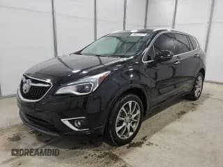 ✅ 2020 Buick Envision Essence • VIN: LRBFX2SA1LD231007 • Lot: 87306555. Listed on Copart with 87,585 mi. Free auction sales archive from the USA and detailed vehicle history report at DreamBid. Image 1.