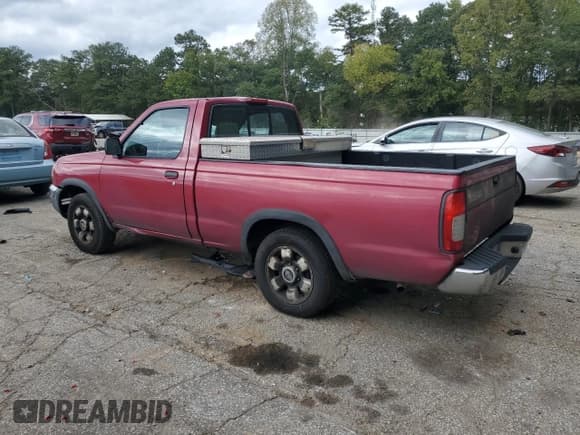✅ 1998 Nissan Frontier XE • VIN: 1N6DD21S3WC343701 • Lot: 85781925. Listed on Copart with 287,967 mi. Free auction sales archive from the USA and detailed vehicle history report at DreamBid. Image 2.