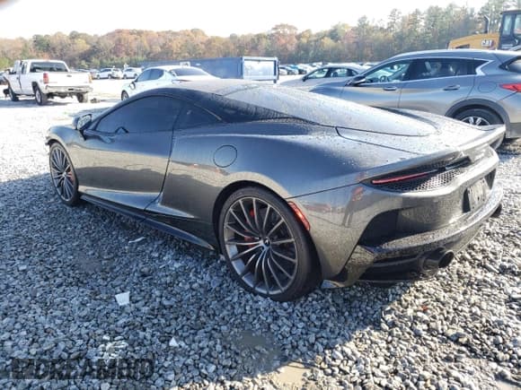 ✅ 2021 McLaren GT • VIN: SBM22GCA8MW001374 • Lot: 82147064. Listed on Copart with 32,562 mi. Free auction sales archive from the USA and detailed vehicle history report at DreamBid. Image 2.