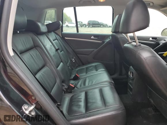 ✅ 2012 Volkswagen Tiguan LE • VIN: WVGAV7AX9CW555942 • Lot: 51303575. Listed on Copart with 130,491 mi. Free auction sales archive from the USA and detailed vehicle history report at DreamBid. Image 11.