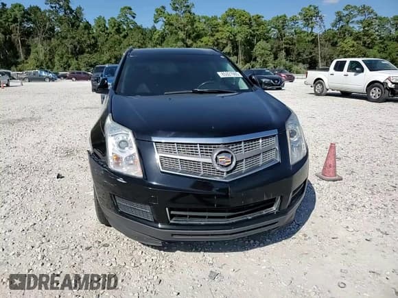 ✅ 2012 Cadillac SRX • VIN: 3GYFNGE3XCS641249 • Lot: 85921985. Listed on Copart with 124,022 mi. Free auction sales archive from the USA and detailed vehicle history report at DreamBid. Image 14.