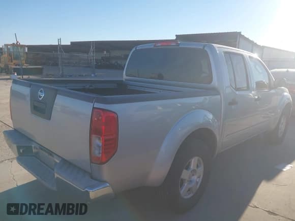 ✅ 2007 Nissan Frontier SE • VIN: 1N6AD07U57C400076 • Lot: 43886347. Listed on IAAI with 169,458 mi. Free auction sales archive from the USA and detailed vehicle history report at DreamBid. Image 4.