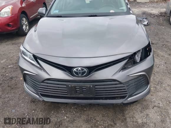 2021 Toyota Camry LE with VIN 4T1C11BK5MU028031, listed as a IAAI auction lot 42502600 with 115,138 mi miles and . Bid and sale history available at DreamBid. Image 13.