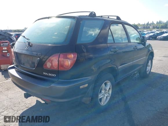 ✅ 1999 Lexus RX 300 • VIN: JT6HF10U6X0040143 • Lot: 42911748. Listed on IAAI with 237,114 mi. Free auction sales archive from the USA and detailed vehicle history report at DreamBid. Image 4.