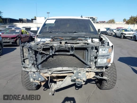 ✅ 2015 Chevrolet Silverado 1500 LT • VIN: 3GCUKREC0FG293390 • Лот: 41321751. Опубликован ранее на IAAI с пробегом Не указан. Бесплатный доступ к архиву аукционных продаж из США и подробный отчёт об истории автомобиля на DreamBid. Изображение 13.