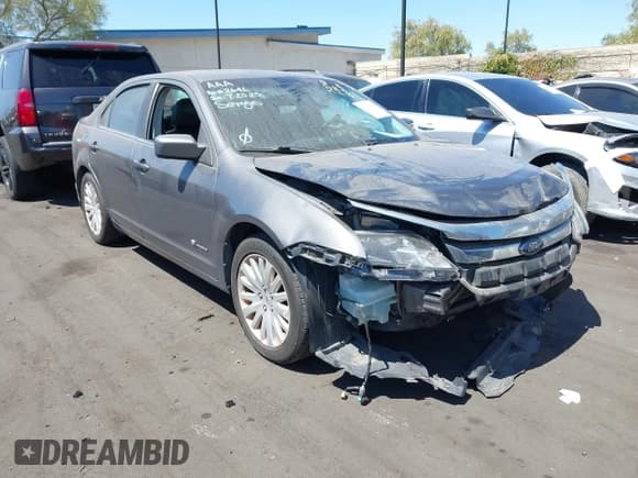 ✅ 2010 Ford Fusion Hybrid • VIN: 3FADP0L38AR221680 • Lot: 43175219. Wystawiony na IAAI z przebiegiem 215 650 mil. Bezpłatny archiwum sprzedaży aukcyjnych z USA i szczegółowy raport historii pojazdu na DreamBid. Zdjęcie 1.