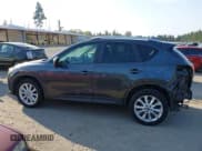 ✅ 2015 Mazda CX-5 Grand Touring • VIN: JM3KE4DY3F0509243 • Lot: 43252834. Listed on IAAI with 139,870 mi. Free auction sales archive from the USA and detailed vehicle history report at DreamBid. Image 15.