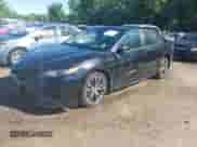 2020 Toyota Camry SE with VIN 4T1M11BK2LU010539, listed as a IAAI auction lot 42292336 with 39,342 mi miles and . Bid and sale history available at DreamBid. Image 2.