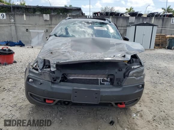 ✅ 2023 Jeep Cherokee Trailhawk • VIN: 1C4PJMBN7PD116214 • Lot: 55080845. Listed on Copart with 14,611 mi. Free auction sales archive from the USA and detailed vehicle history report at DreamBid. Image 5.