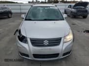 ✅ 2013 Suzuki SX4 Crossover • VIN: JS2YB5A30D6100630 • Lot: 76316874. Wystawiony na Copart z przebiegiem 162 222 mil. Bezpłatny archiwum sprzedaży aukcyjnych z USA i szczegółowy raport historii pojazdu na DreamBid. Zdjęcie 5.