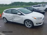 ✅ 2016 Ford Focus Titanium • VIN: 1FADP3N26GL387872 • Lot: 42183397. Listed on IAAI with 30,557 mi. Free auction sales archive from the USA and detailed vehicle history report at DreamBid. Image 13.