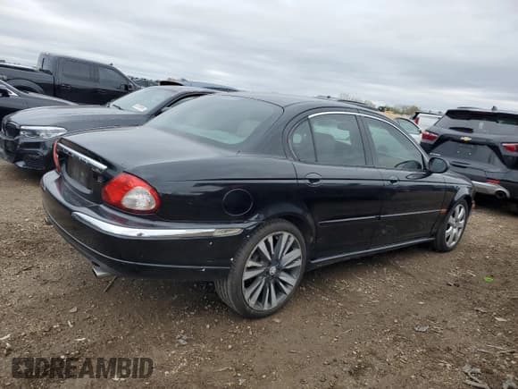✅ 2004 Jaguar X-Type • VIN: SAJEA51C24WE08340 • Lot: 82683605. Listed on Copart with 202,758 mi. Free auction sales archive from the USA and detailed vehicle history report at DreamBid. Image 3.