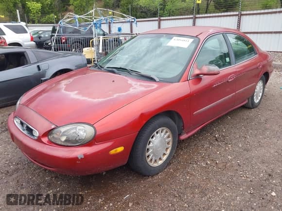 ✅ 1999 Mercury Sable GS • VIN: 1MEFM50UXXA649466 • Lot: 42094811. Listed on IAAI with 122,644 mi. Free auction sales archive from the USA and detailed vehicle history report at DreamBid. Image 2.