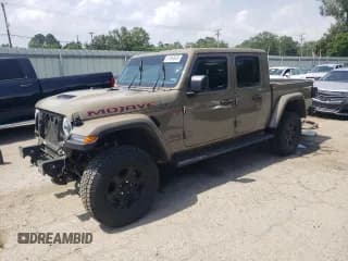 ✅ 2020 Jeep Gladiator Mojave • VIN: 1C6JJTEG7LL202871 • Лот: 57490545. Опубликован ранее на Copart с пробегом 101 747 миль. Бесплатный доступ к архиву аукционных продаж из США и подробный отчёт об истории автомобиля на DreamBid. Изображение 1.