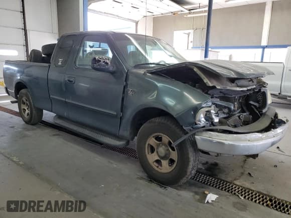 ✅ 2002 Ford F-150 XL • VIN: 2FTRX17L32CA62481 • Lot: 71881475. Listed on Copart with Not provided. Free auction sales archive from the USA and detailed vehicle history report at DreamBid. Image 4.