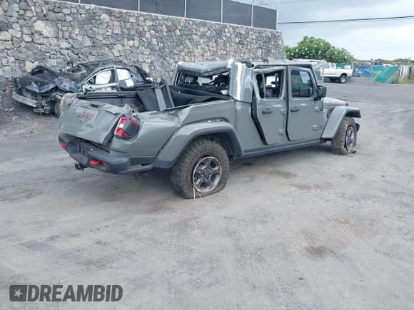 ✅ 2020 Jeep Gladiator Rubicon • VIN: 1C6JJTBG8LL186975 • Lot: 43010773. Listed on IAAI with 85,634 mi. Free auction sales archive from the USA and detailed vehicle history report at DreamBid. Image 4.