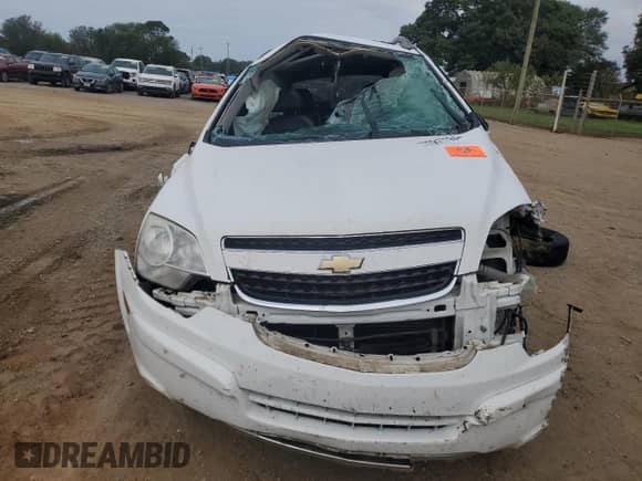 2012 Chevrolet Captiva Sport LTZ z VIN 3GNFL4E57CS638280, wystawiony jako Copart lot #73817564 z przebiegiem Nie podano mil oraz Szkoda całkowita • Salvage title. Historia ofert i sprzedaży dostępna na DreamBid. Obrazek 5.