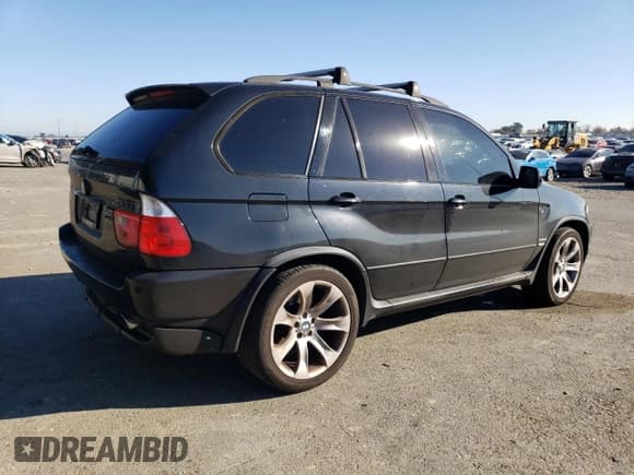 ✅ 2005 BMW X5 4.8is • VIN: 5UXFA93515LE83489 • Lot: 87840265. Listed on Copart with 131,786 mi. Free auction sales archive from the USA and detailed vehicle history report at DreamBid. Image 3.