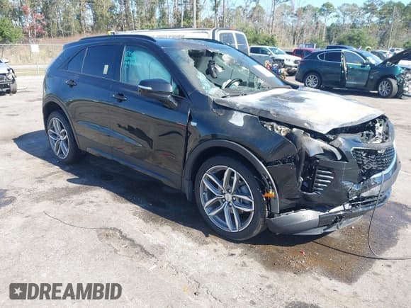 ✅ 2022 Cadillac XT4 FWD Sport • VIN: 1GYFZER45NF169304 • Lot: 43589404. Listed on IAAI with Not provided. Free auction sales archive from the USA and detailed vehicle history report at DreamBid. Image 1.