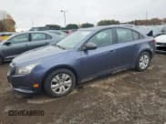 ✅ 2014 Chevrolet Cruze LS • VIN: 1G1PA5SG1E7143825 • Lot: 90257015. Listed on Copart with 171,602 mi. Free auction sales archive from the USA and detailed vehicle history report at DreamBid. Image 1.