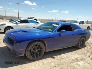 ✅ 2021 Dodge Challenger SXT • VIN: 2C3CDZAG6MH576683 • Lot: 62099434. Wystawiony na Copart z przebiegiem 98 495 mil. Bezpłatny archiwum sprzedaży aukcyjnych z USA i szczegółowy raport historii pojazdu na DreamBid. Zdjęcie 1.