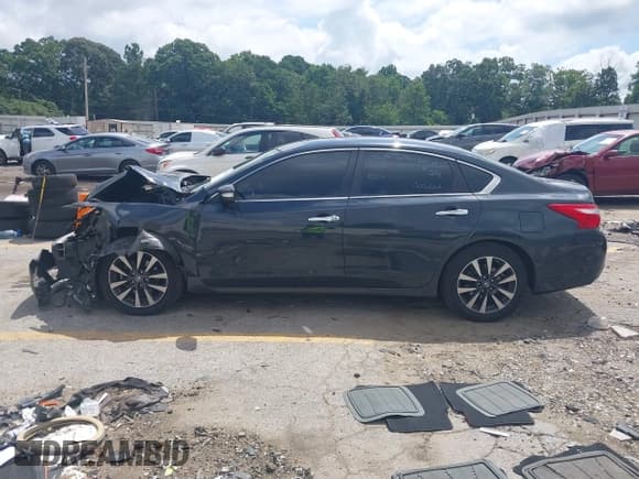 ✅ 2017 Nissan Altima SL • VIN: 1N4AL3AP0HC269804 • Lot: 42747798. Listed on IAAI with 128,777 mi. Free auction sales archive from the USA and detailed vehicle history report at DreamBid. Image 14.