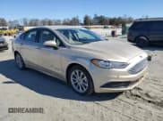 ✅ 2017 Ford Fusion Hybrid SE • VIN: 3FA6P0LU6HR203853 • Lot: 92791745. Listed on Copart with 116,769 mi. Free auction sales archive from the USA and detailed vehicle history report at DreamBid. Image 4.