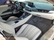 ✅ 2015 BMW i8 • VIN: WBY2Z2C5XFV392089 • Лот: 80097805. Опубликован ранее на Copart с пробегом 65 036 миль. Бесплатный доступ к архиву аукционных продаж из США и подробный отчёт об истории автомобиля на DreamBid. Изображение 8.