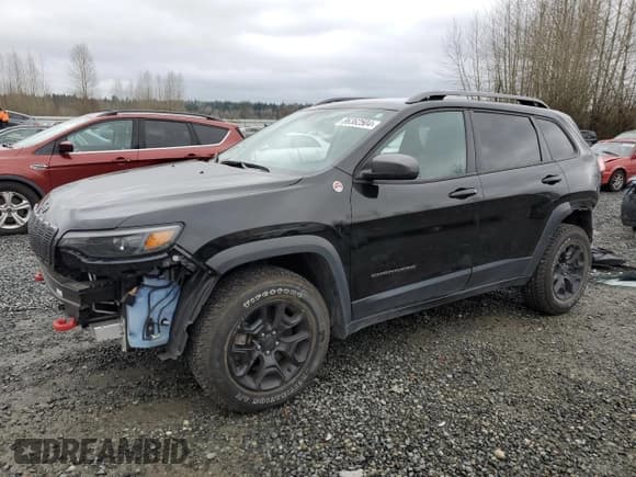 ✅ 2020 Jeep Cherokee Trailhawk Elite • VIN: 1C4PJMBX9LD597319 • Lot: 86362504. Listed on Copart with 21,050 mi. Free auction sales archive from the USA and detailed vehicle history report at DreamBid. Image 1.