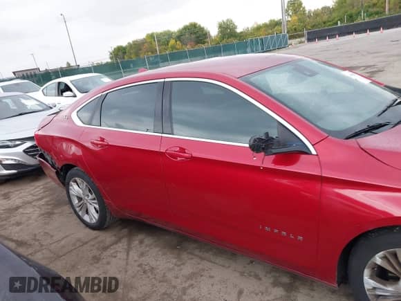 2014 Chevrolet Impala LT with VIN 2G1125S34E9208455, listed as a IAAI auction lot 43400888 with 147,895 mi miles and . Bid and sale history available at DreamBid. Image 13.