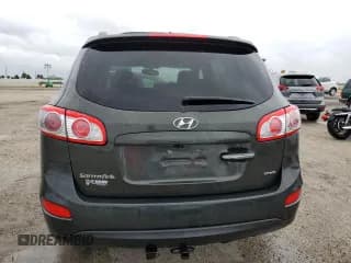 ✅ 2012 Hyundai Santa Fe Limited • VIN: 5XYZK4AG1CG115502 • Lot: 75128574. Listed on Copart with 101,155 mi. Free auction sales archive from the USA and detailed vehicle history report at DreamBid. Image 6.